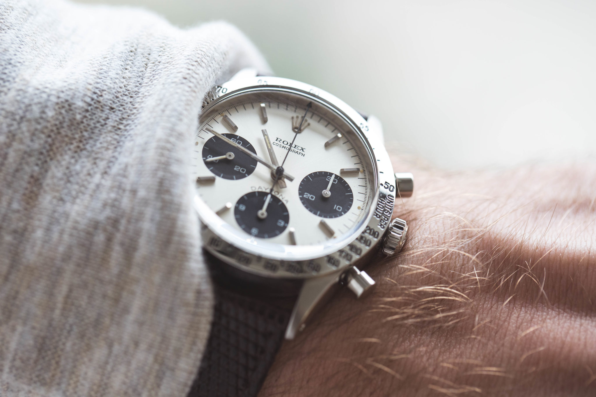 An image of a Rolex Daytona on a man's wrist 