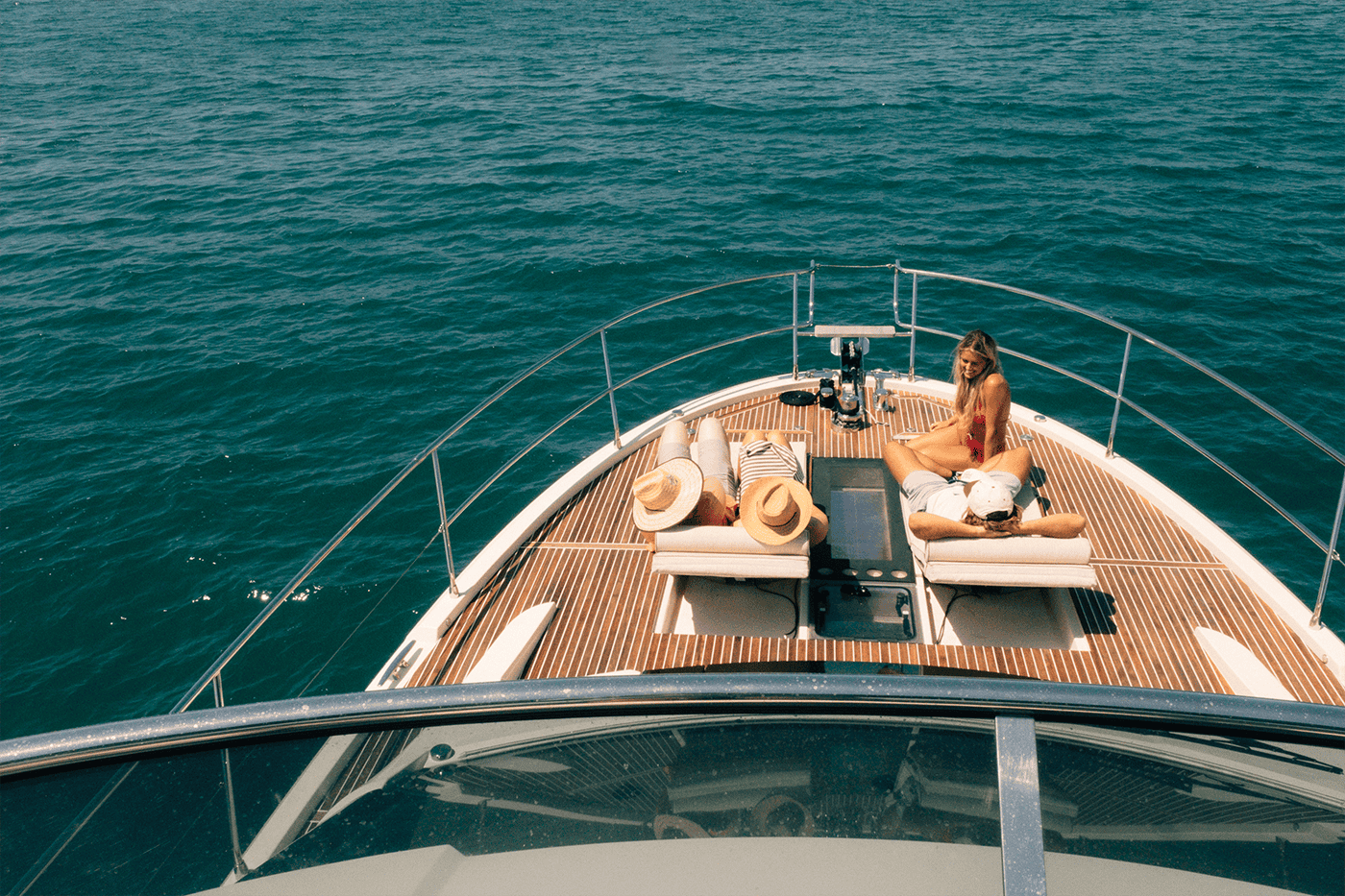 People enjoying a sailboat