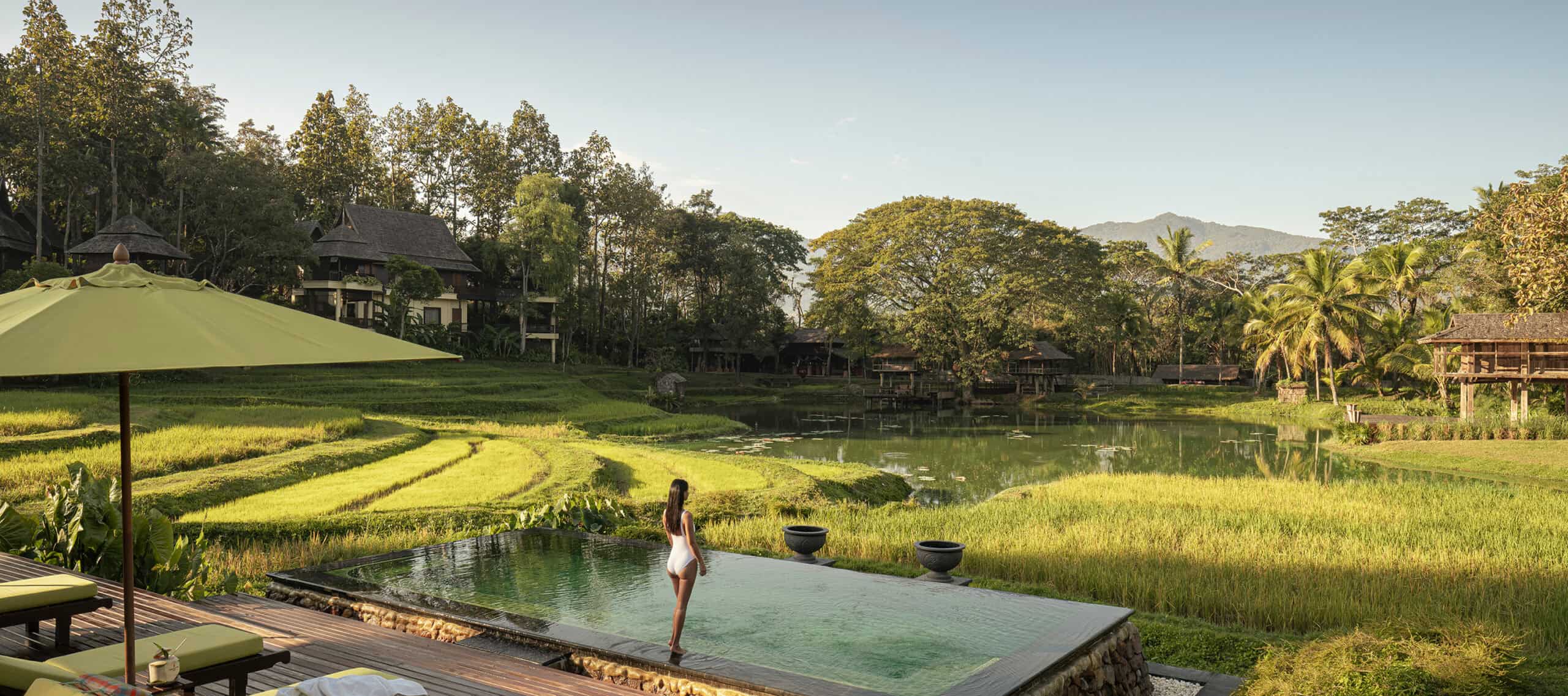 Women in front of a beautiful pool