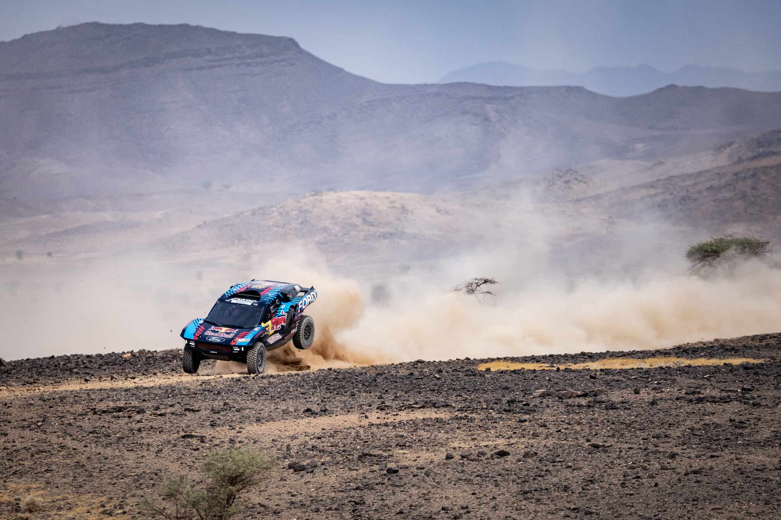 Car diving into the sand dune