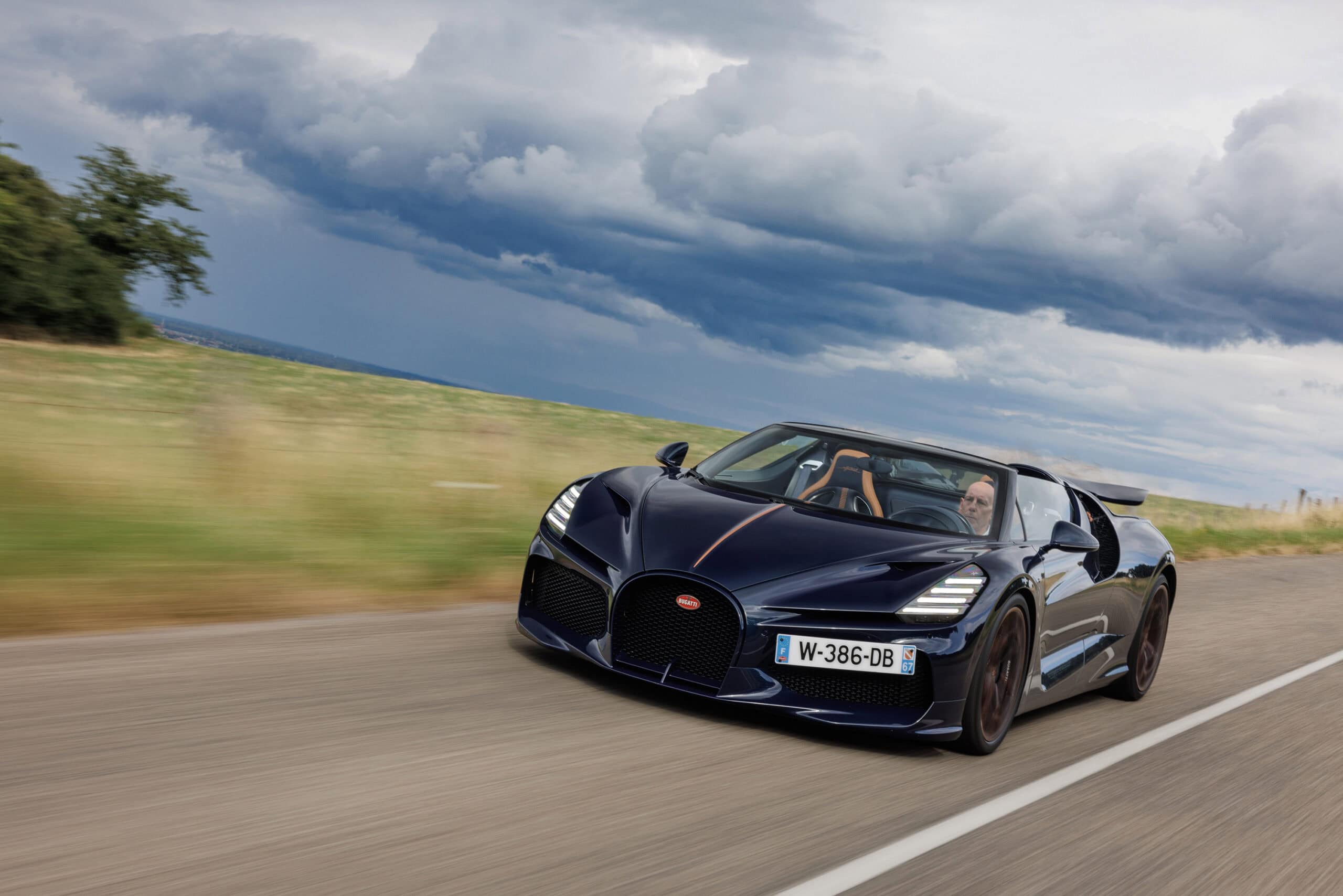 Bugatti zooming on a country road
