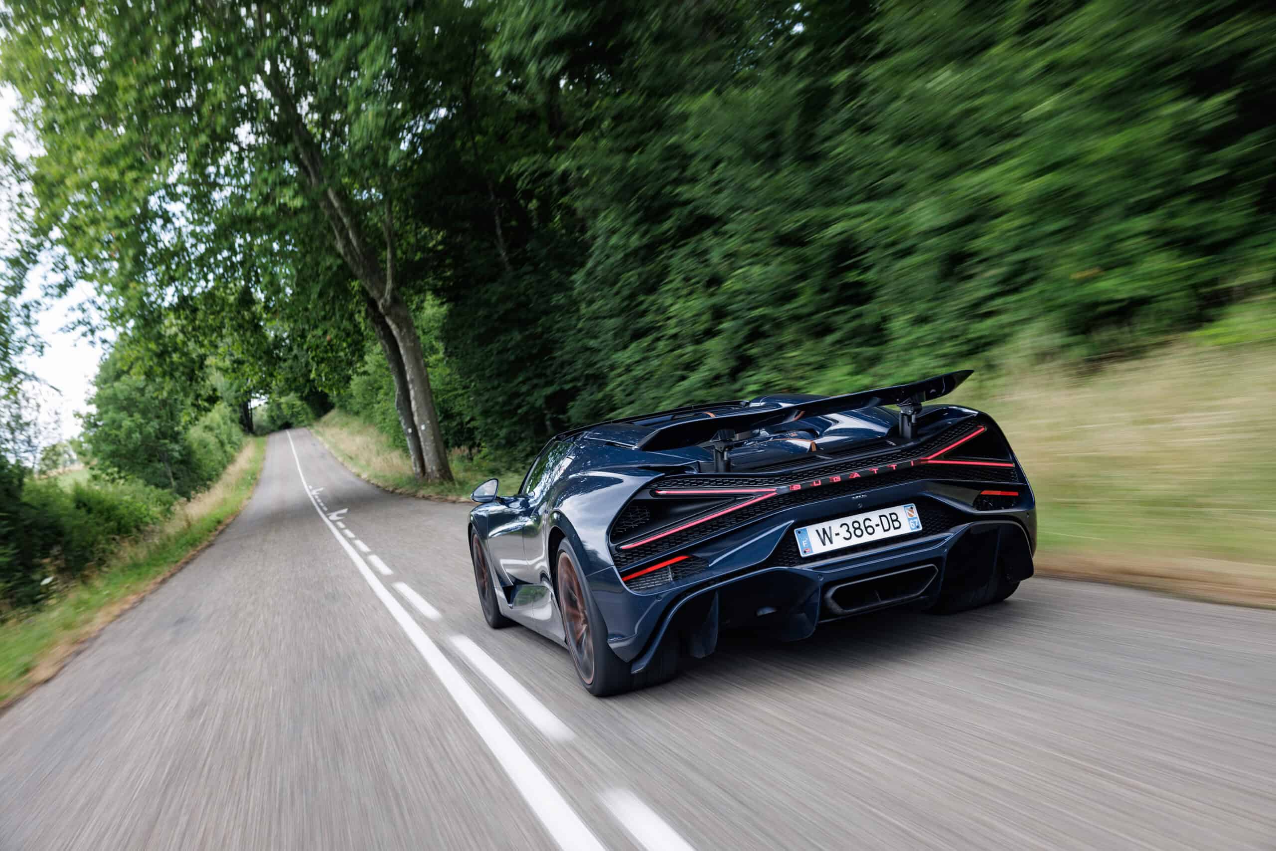 Bugatti zooming on a country road