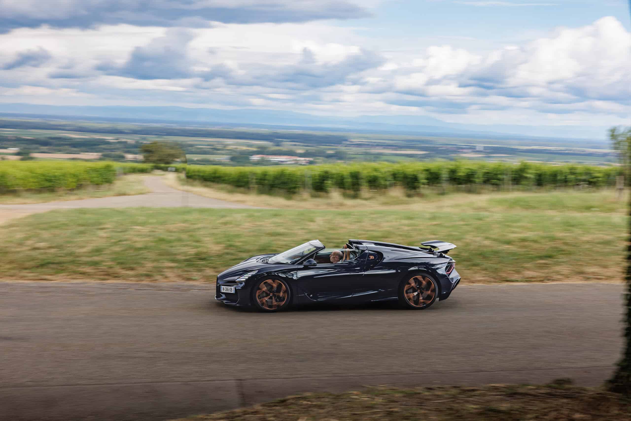 Bugatti zooming on a country road