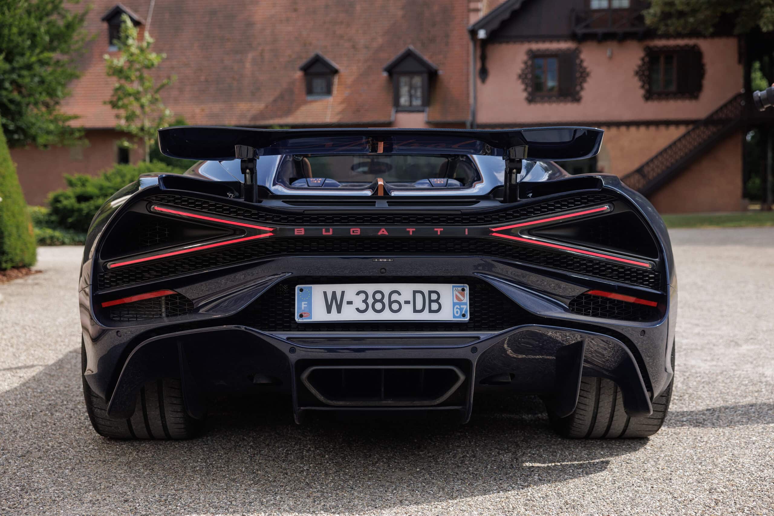 Back of Bugatti with the Bugatti logo and a license plate